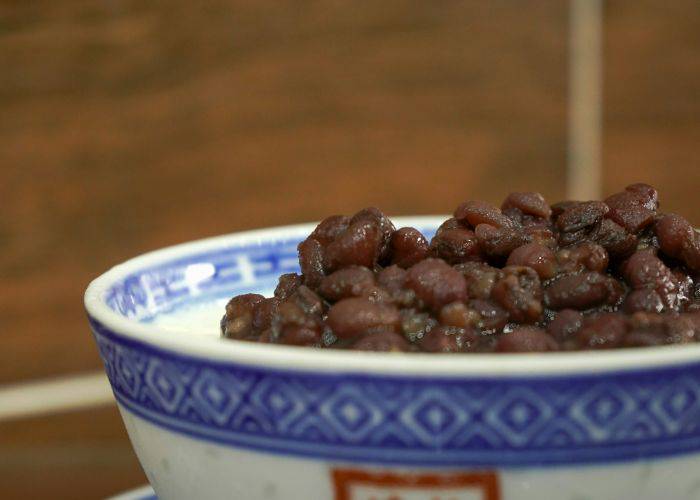 A bowl of Japanese red beans, piled high.